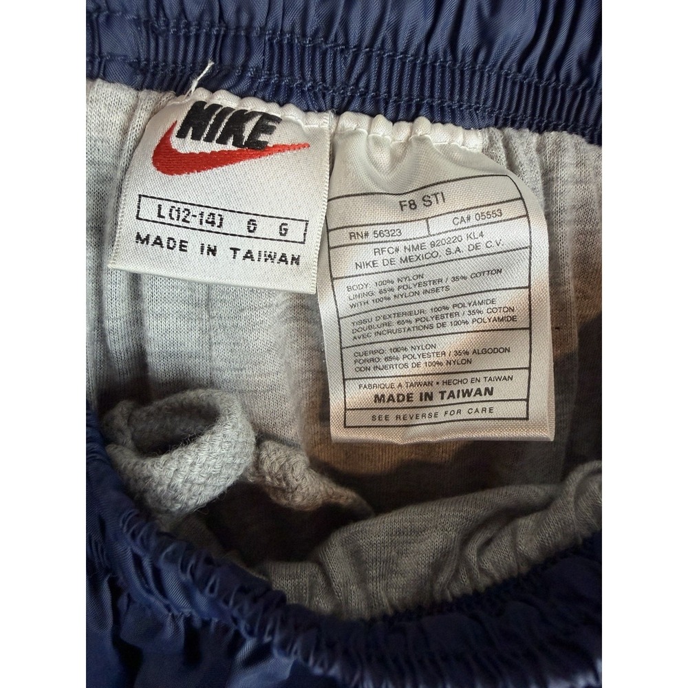 Vintage NIKE Windbreaker Pants 90s Youth Large 14-16 Navy Blue Ankle Zip Lined - Picture 3 of 10
